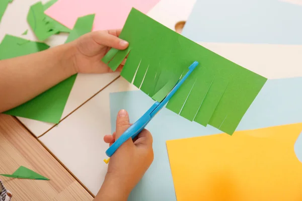 Little Girl Cutting Color Paper Scissors Table Closeup — Stock Photo, Image