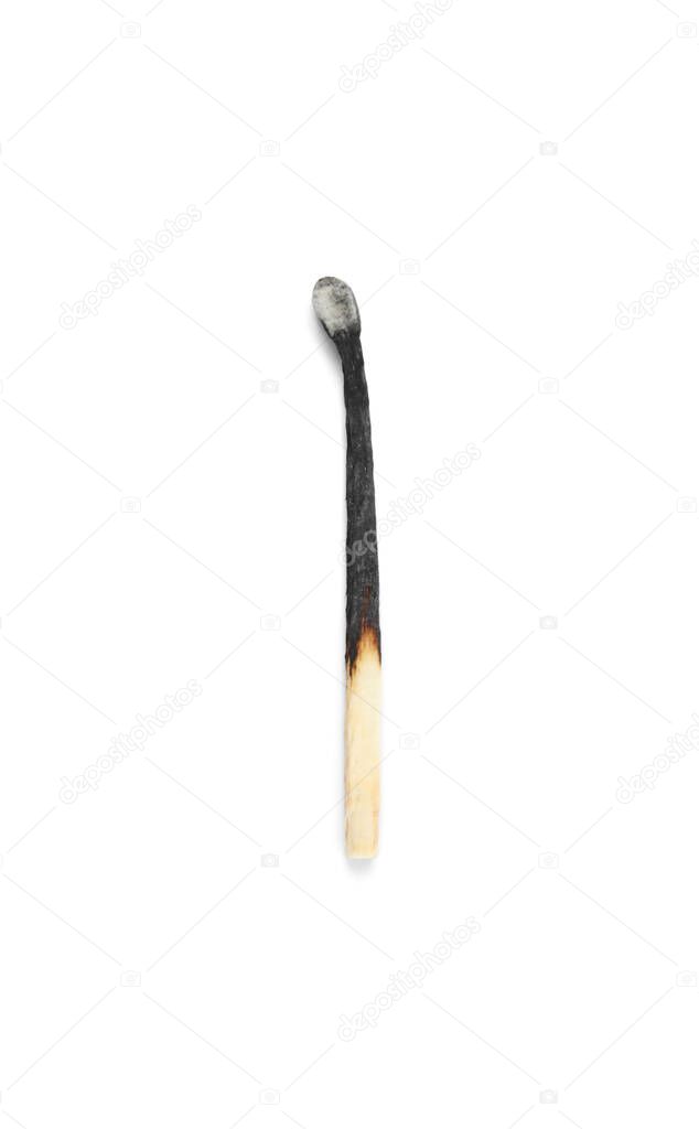Burnt match isolated on white, top view