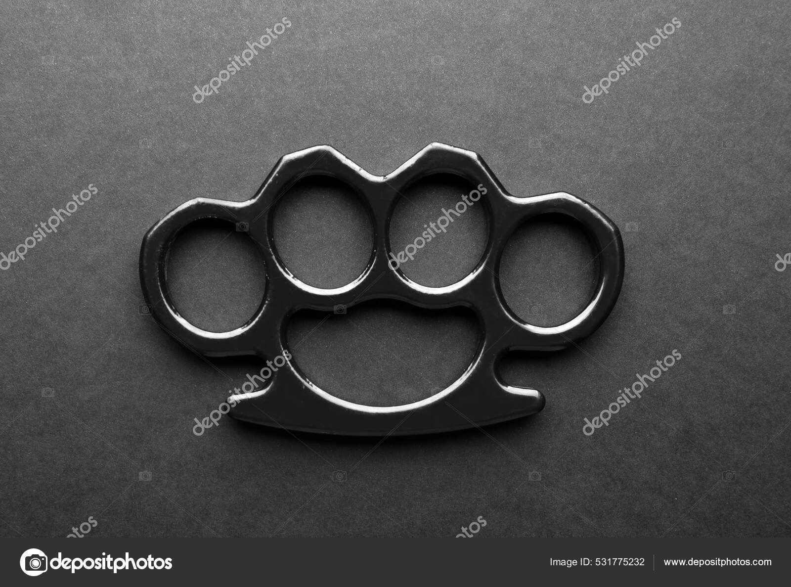 Brass Knuckles on Black Stone Background, Closeup Stock Image - Image of  illegal, damage: 235108309