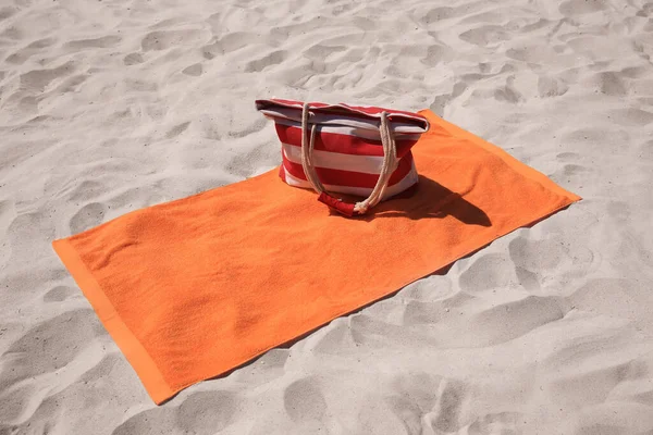 Soft Orange Beach Towel Bag Sand — Stock Photo, Image