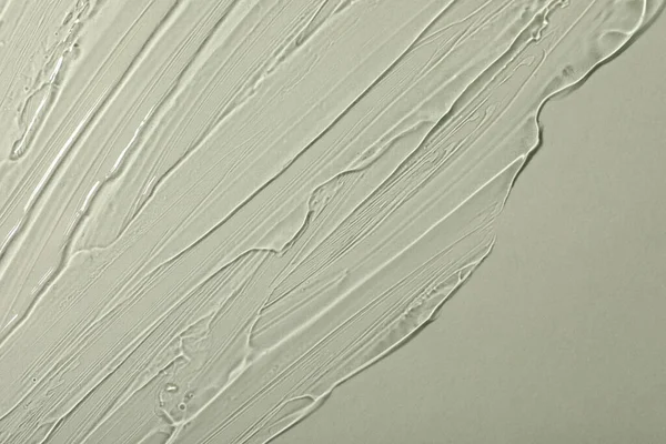 Işık arka planında şeffaf kozmetik jel, üst görünüm