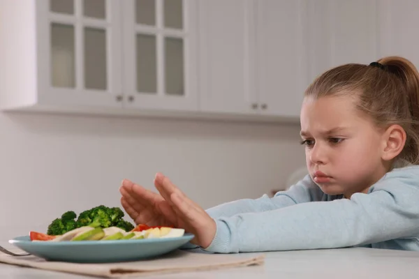 Cute Little Girl Refusing Eat Dinner Kitchen Space Text — Stock Photo, Image