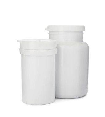 Beyaza izole edilmiş haplı şişeler. Medicament