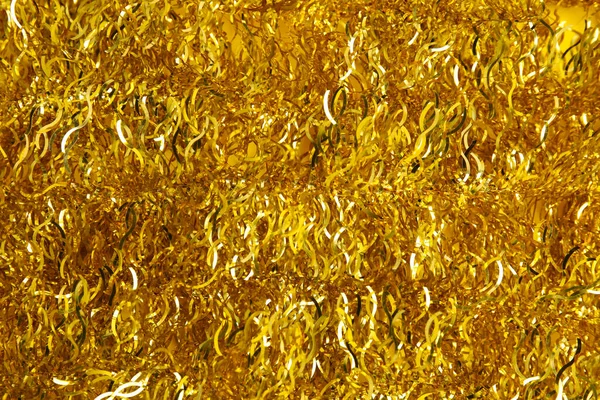 Lesklý Zlatý Tinsel Jako Pozadí Horní Pohled — Stock fotografie