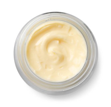Üst görünümde izole edilmiş bir kavanoz vücut kremi.