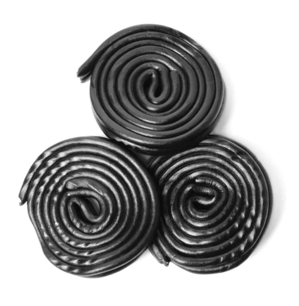 Lekkere Zwarte Drop Snoepjes Witte Achtergrond Bovenaanzicht — Stockfoto