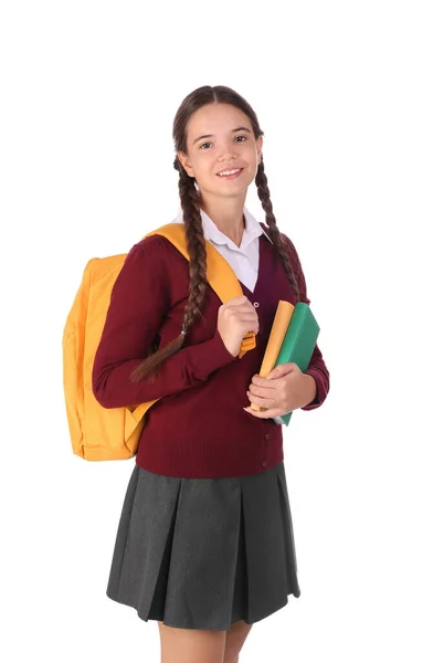 Teenage Dívka Školní Uniformě Knihami Batohem Bílém Pozadí — Stock fotografie