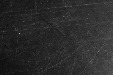 Çizilmiş siyah yüzey dokusu arkaplan olarak, yakın plan