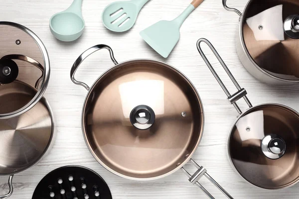 New Cookware Set Kitchen Utensils White Wooden Table Flat Lay — Stock Photo, Image