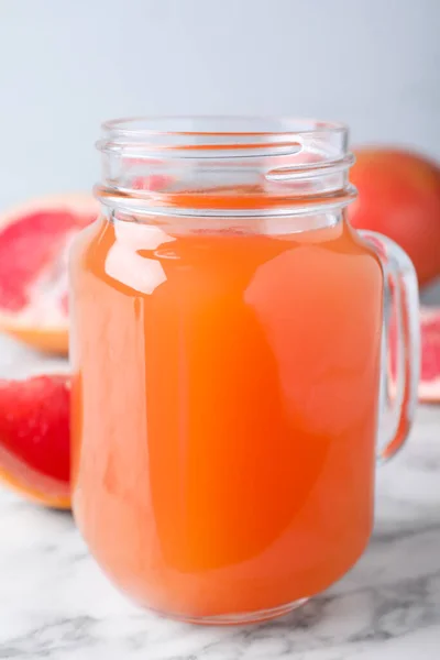Tasty Freshly Made Grapefruit Juice White Marble Table — Stock Photo, Image