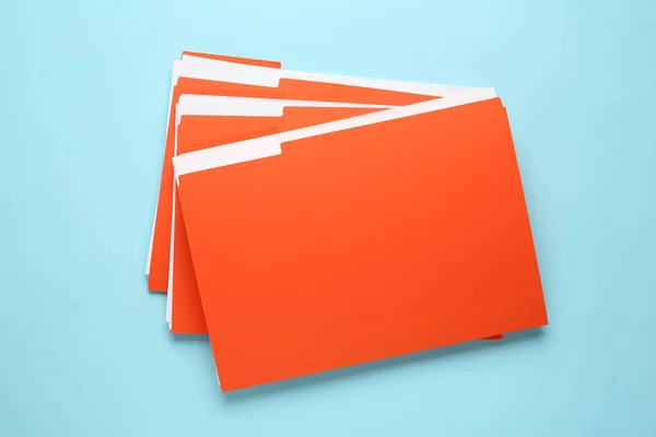 Πορτοκαλί Αρχεία Έγγραφα Γαλάζιο Φόντο Κορυφαία Προβολή — Φωτογραφία Αρχείου