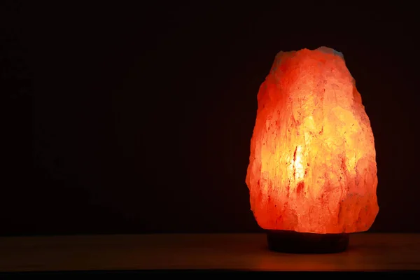 Himalayan Salt Lamp Wooden Table Dark Background Space Text — 图库照片