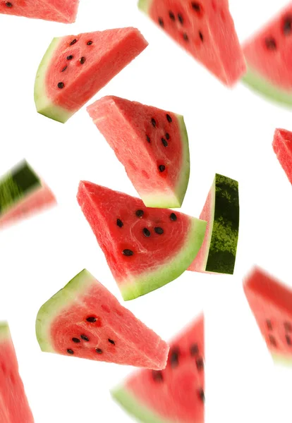 Slices Delicious Ripe Watermelon Falling White Background — Stock Photo, Image