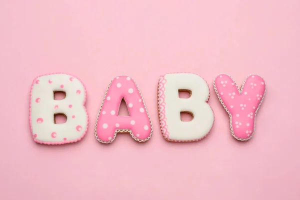 Palabra Bebé Hecho Sabrosas Galletas Sobre Fondo Rosa Plano Laico — Foto de Stock