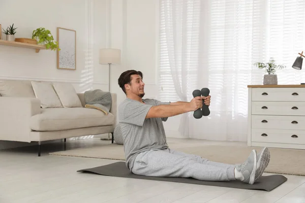 Overweight Man Doing Exercise Dumbbells Mat Home — Stock Photo, Image