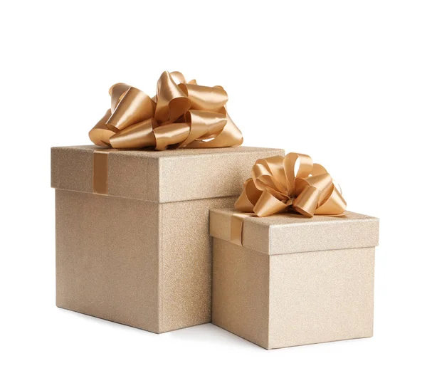Golden Gift Boxes Satin Bows White Background — 图库照片