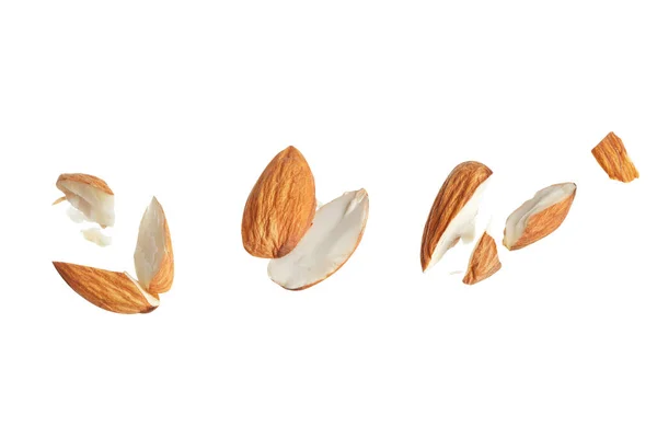Pieces Tasty Almonds White Background — Stock Photo, Image