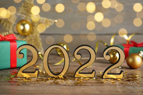 Número 2022 Decoração Festiva Mesa Madeira Efeito Bokeh Feliz Ano — Fotografia de Stock