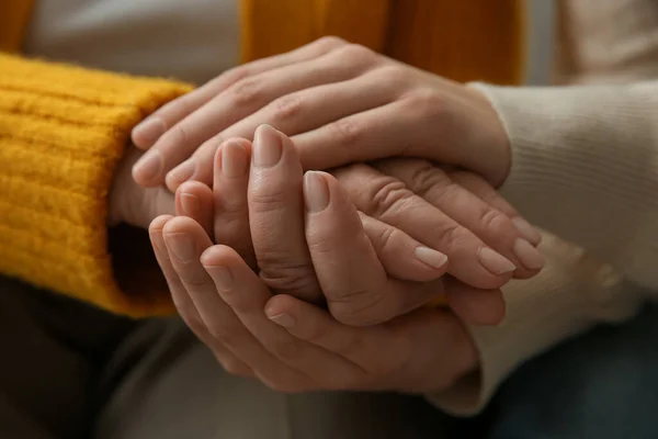 Young Elderly Women Holding Hands Together Closeup — 图库照片