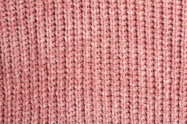 Arka plan olarak güzel pembe örülmüş kumaş, üst görünüm