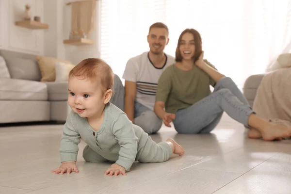 Happy Parents Watching Cute Baby Crawl Floor Home — Stock Photo, Image