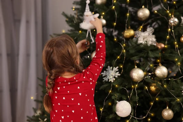 Cute Little Child Decorating Christmas Tree Home Back View — Stock Photo, Image