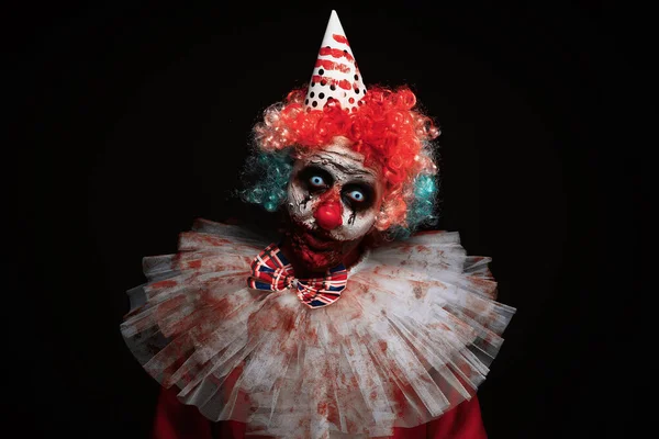 可怕的小丑在黑色背景 万圣节派对服装 — 图库照片