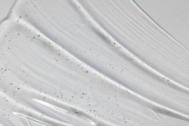 Beyaz arka planda kozmetik jel, üst görünüm