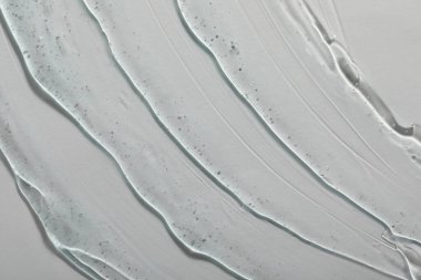 Beyaz arka planda kozmetik jel, üst görünüm