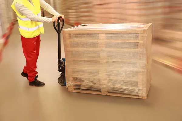 Worker Moving Wrapped Wooden Pallets Manual Forklift Warehouse Closeup — Fotografia de Stock