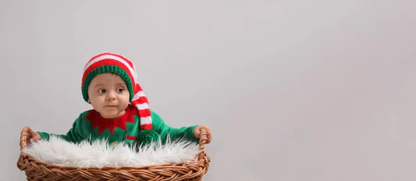 Cute Baby Wearing Elf Costume Wicker Basket Light Grey Background — Stockfoto