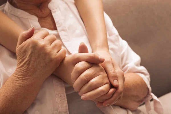 Young Elderly Women Hugging Sofa Closeup — Stock Photo, Image
