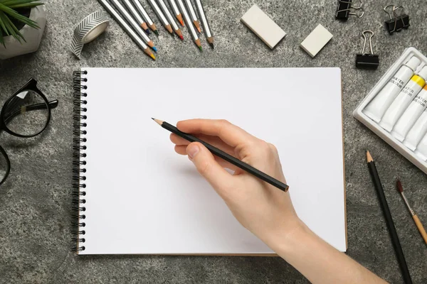 Woman Pencil Blank Sketchbook Grey Stone Table Top View — Stockfoto