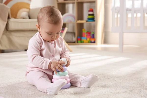 Cute Baby Girl Playing Toy Pyramid Floor Home — Stockfoto