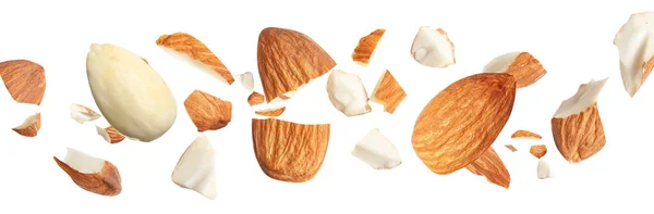 Pieces Tasty Almonds Falling White Background Banner Design — Stock Photo, Image