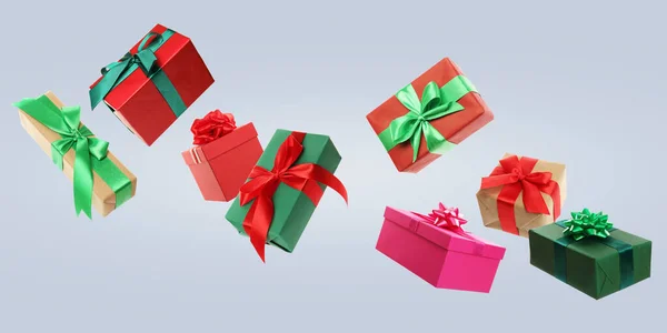 Beautifully Wrapped Gift Boxes Flying Light Background — стоковое фото