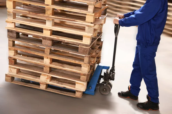 Worker Moving Wooden Pallets Manual Forklift Warehouse Closeup — Fotografia de Stock