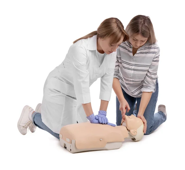 Doctor Uniform Demonstrating First Aid Mannequin White Background — Stockfoto