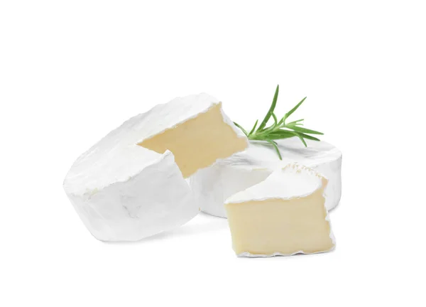 Tasty Cut Whole Brie Cheeses Rosemary White Background — Foto Stock