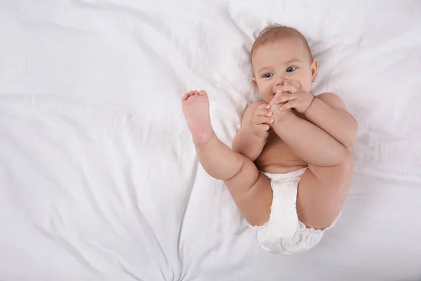 Cute Baby Dry Soft Diaper White Bed Top View Space — Stockfoto