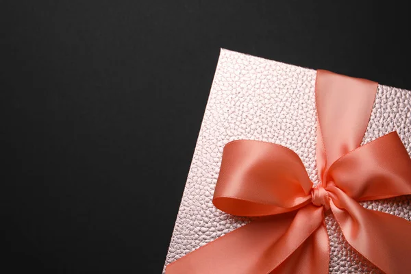 Gift Box Satin Ribbon Bow Black Background Top View Space — Zdjęcie stockowe