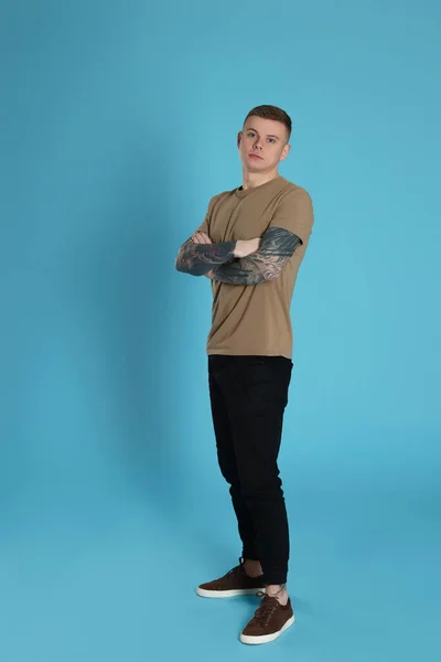 Young Man Tattoos Light Blue Background — Foto Stock