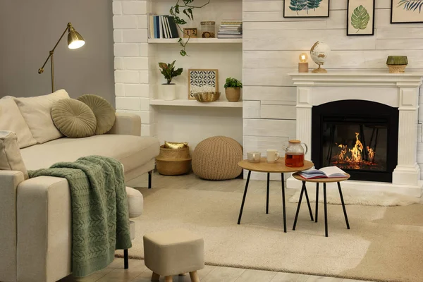 Stylish Living Room Interior Comfortable Sofa Decorative Fireplace — 图库照片