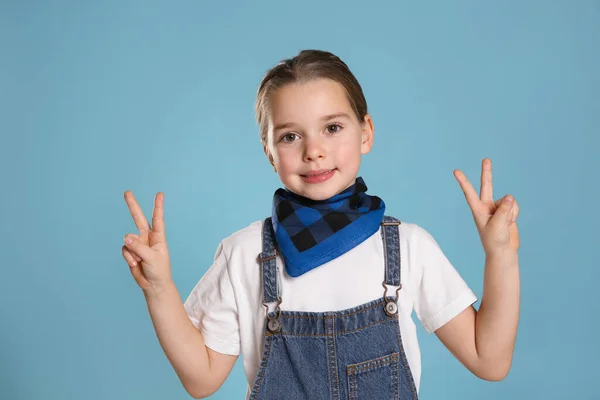 Cute Little Girl Wearing Stylish Bandana Turquoise Background — Zdjęcie stockowe