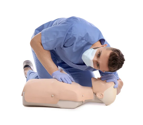 Doctor Uniform Protective Mask Practicing First Aid Mannequin White Background — Stok fotoğraf