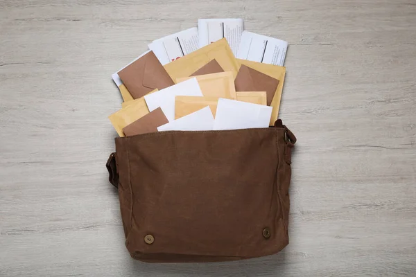 Brown Postman Bag Newspapers Mails White Wooden Table Flat Lay — Stock Photo, Image