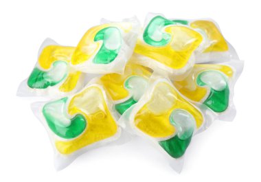 Pile of dishwasher detergent pods on white background