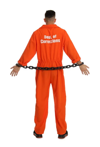 Prisoner Orange Jumpsuit Chained Hands White Background Back View — стоковое фото