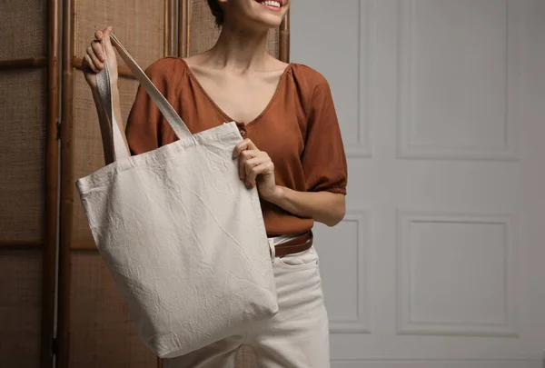 Happy Young Woman Blank Eco Friendly Bag Indoors Closeup Space — Foto Stock