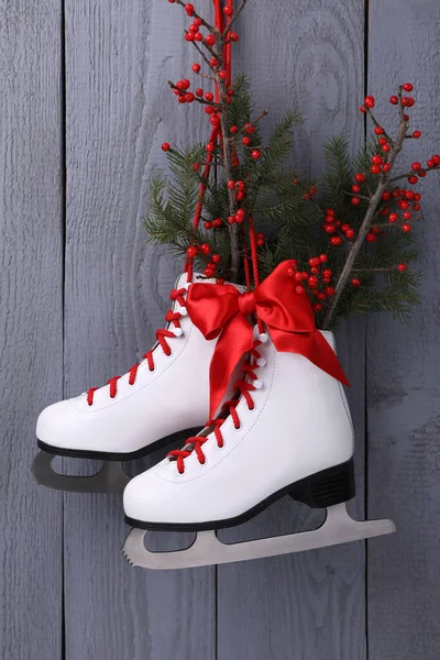 Pair Ice Skates Christmas Decor Hanging Grey Wooden Wall — Stock Photo, Image